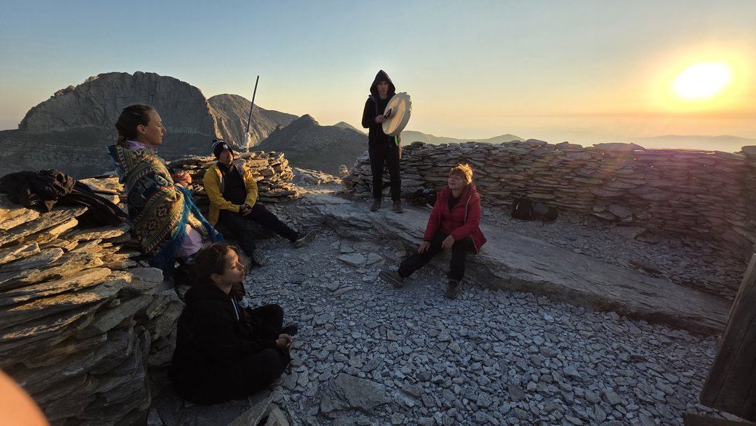 Drum meditation session in progress with facilitator