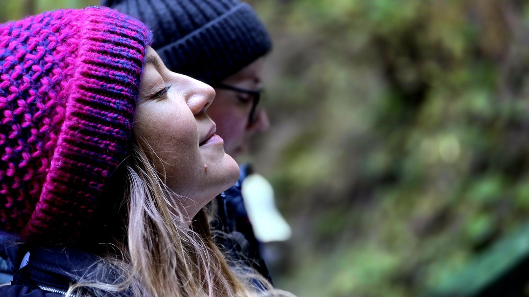 Person meditating with a drum