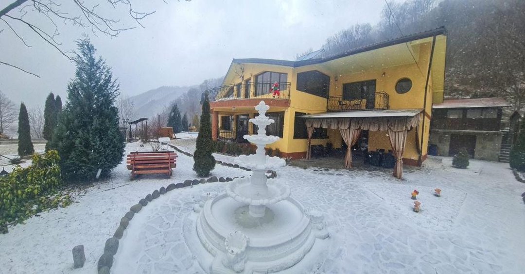 Man in a hot tub in winter